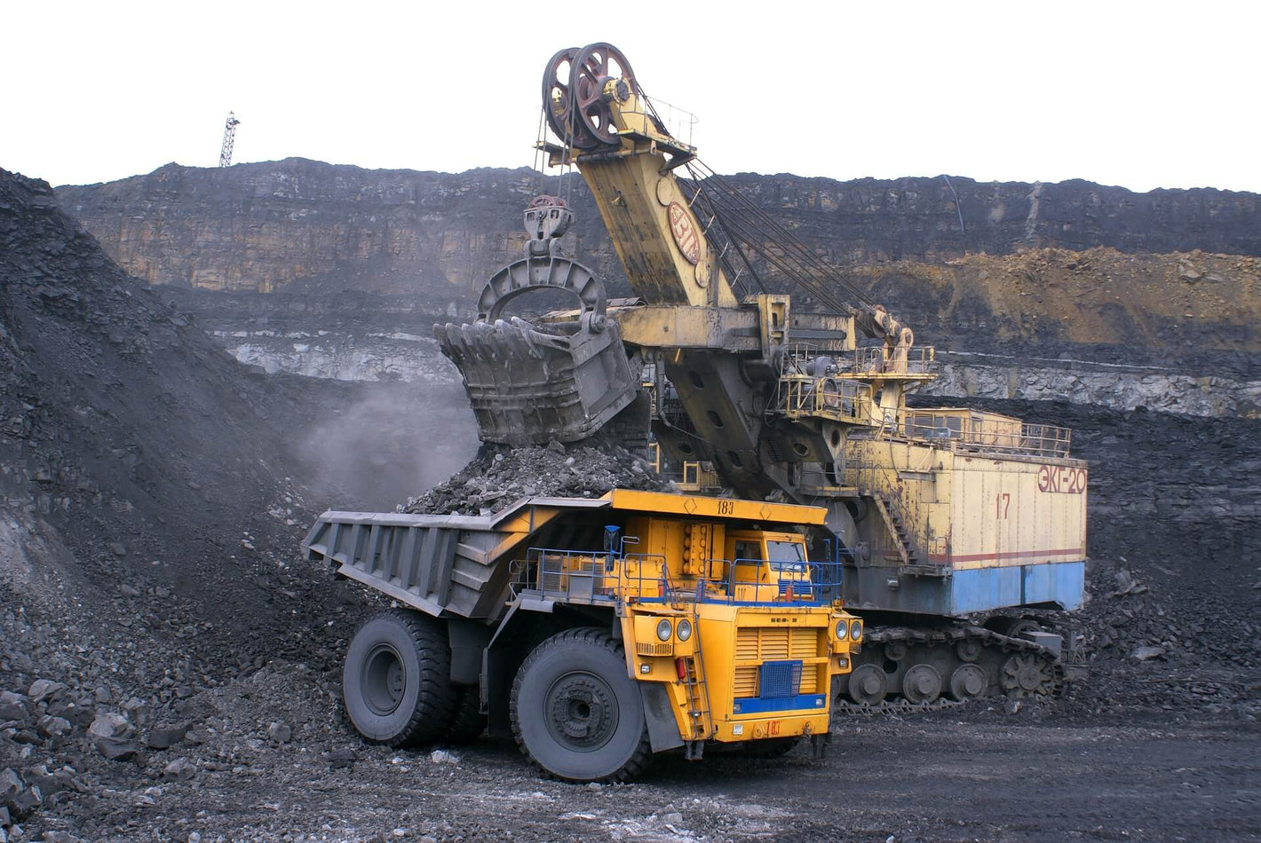 Heavy machinery working in open-pit mining operation